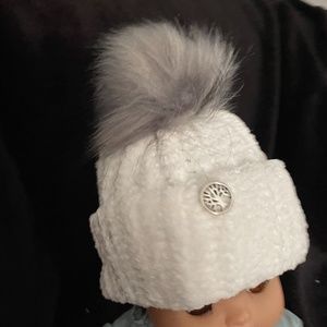 Baby white Knitted Toque with Light Grey Faux Fur pompom.